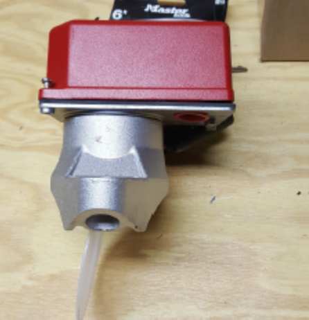 Flow Switch Paddle Side View Side view of a typical the water flow switch